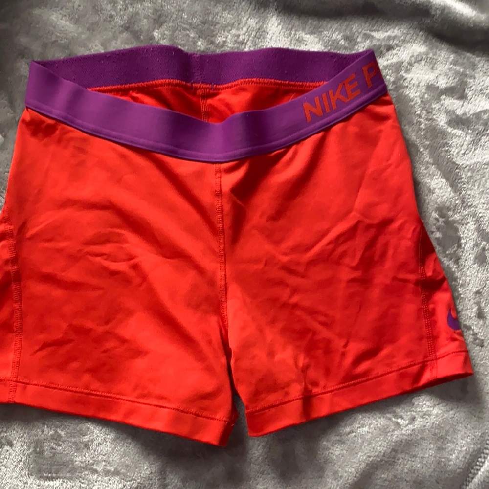 Orange/ red and purple Nike spandex